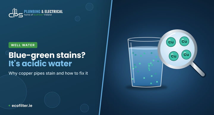Glass of water with copper particles under a magnifier: blue-green stains are caused by acidic water dissolving copper pipes